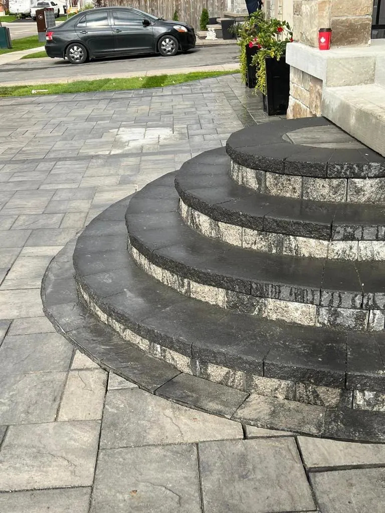 Rounded two-tone natural stone entry steps